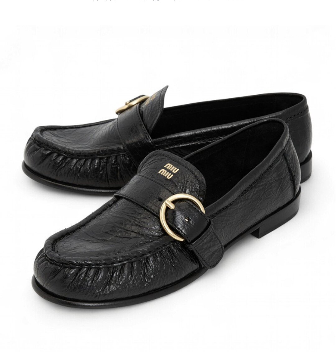 Miu Miu Black leather loafers with crinkled vintage-effect 