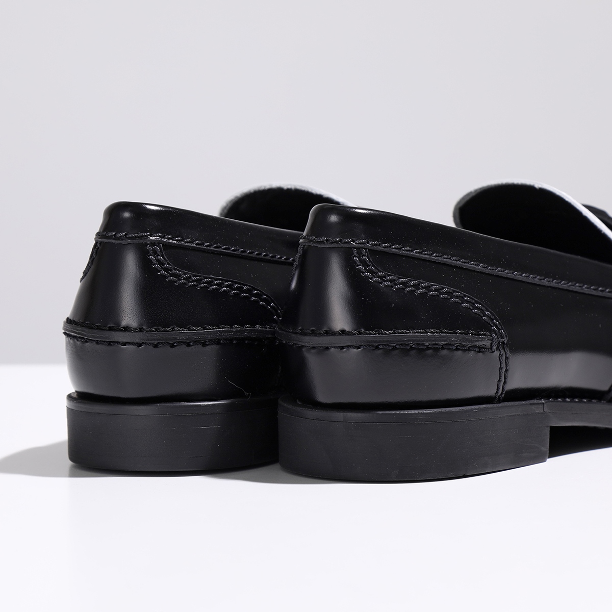 (W) Miu Miu Leather Penny Loafers Black White
