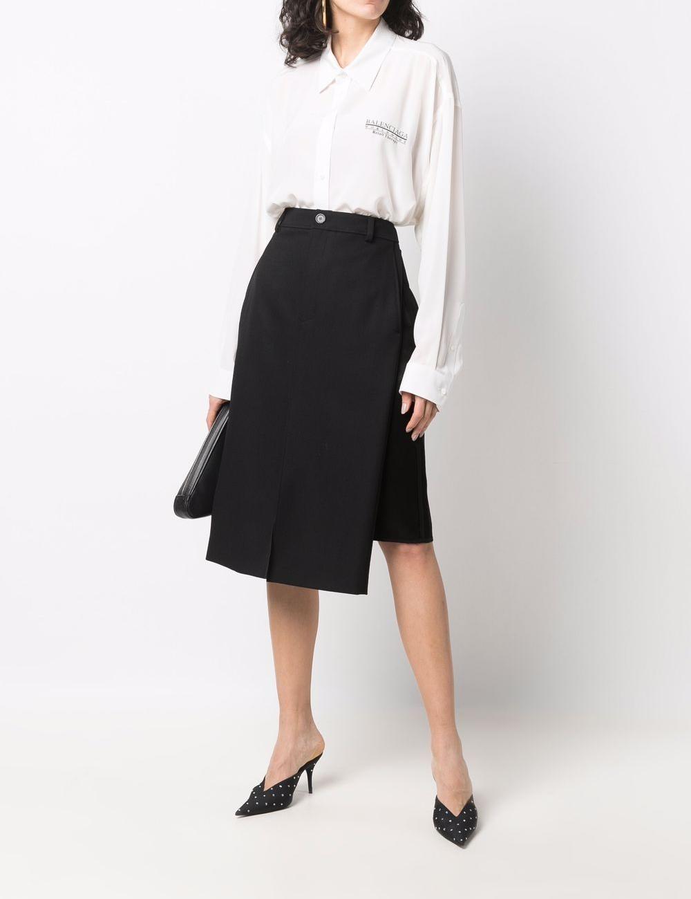 Virgin wool midi skirt with slanted pocket and viscose satin panel